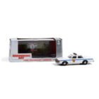 Miniatura coche policía Chevrolet Caprice 1980 Punxsutawney Police de la película El día de la marmota a escala 1/43 con caja de cartón expositora Greenlight