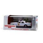 Miniatura coche policía Chevrolet Caprice 1980 Punxsutawney Police de la película El día de la marmota a escala 1/43 con caja de cartón expositora Greenlight