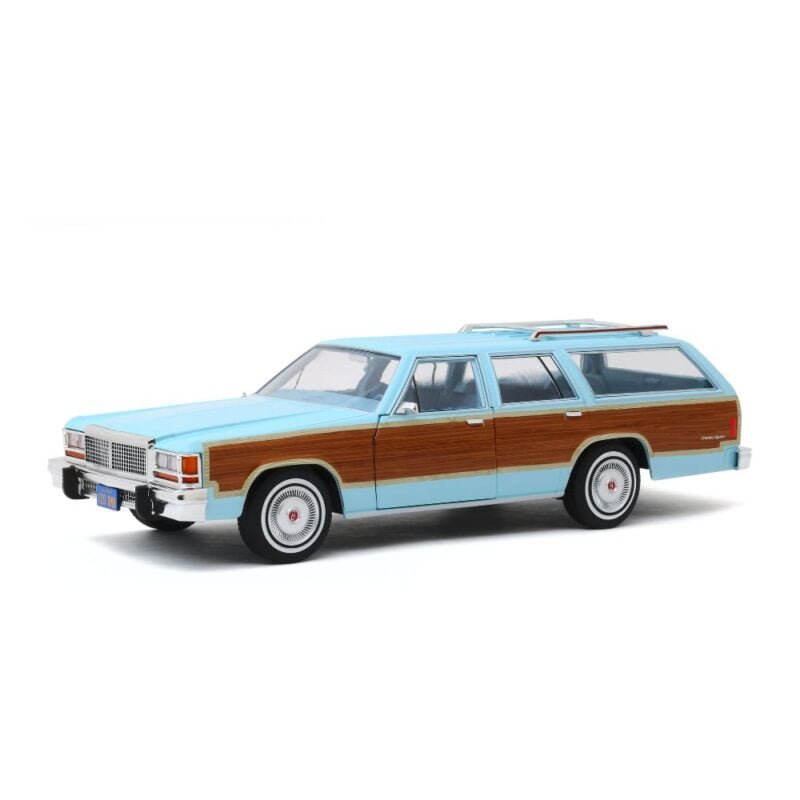 Miniatura coche ranchera Ford LTD Country Squire azul de la serie Los Ángeles de Charlie a escala 1/18 Greenlight