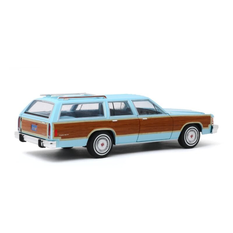 Miniatura coche ranchera Ford LTD Country Squire azul de la serie Los Ángeles de Charlie a escala 1/18 Greenlight