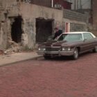 Coche Cadillac Sedan deVille 1973 rojo película Rocky