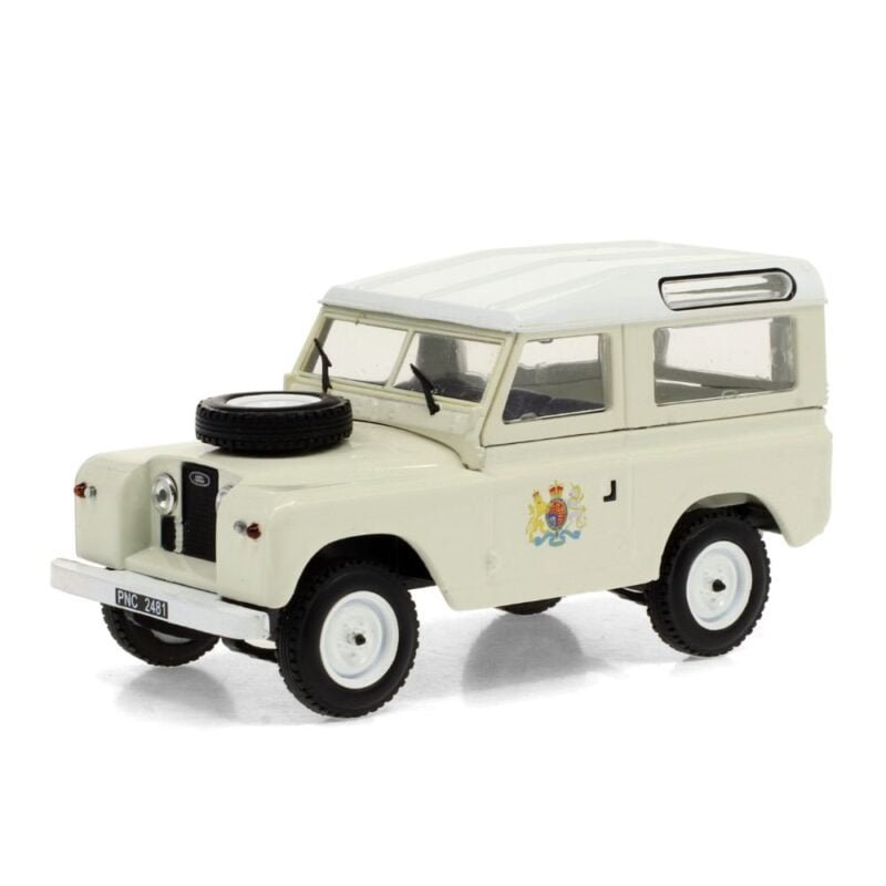 Miniatura coche todoterreno beige Land Rover 88 Series II de la película Ace Ventura: Operación África a escala 1/43 Greenlight