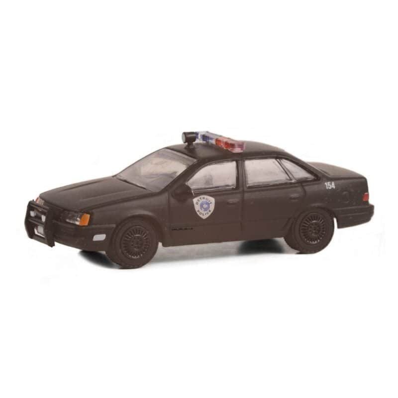 Miniatura coche Policía de Detroit Ford Taurus 1986 negro desgastado de la película RoboCop a escala 1/64 Greenlight