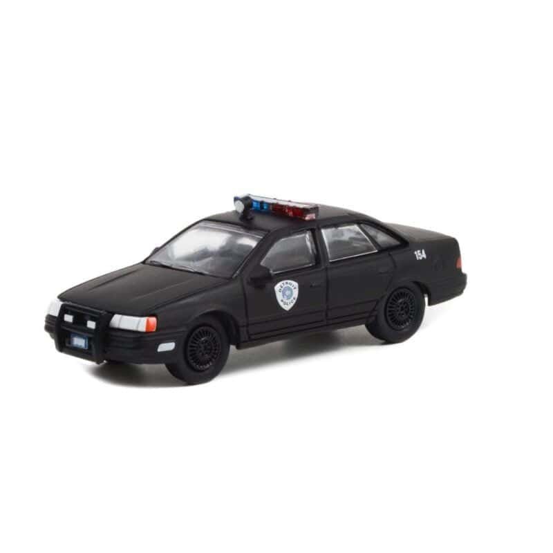 Miniatura coche Policía de Detroit Ford Taurus 1986 negro de la película RoboCop a escala 1/64 Greenlight