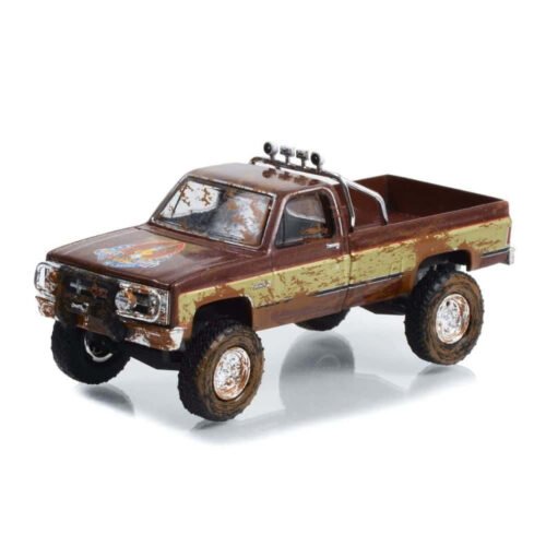 Miniatura coche camioneta marrón GMC K-2500 1982 accidentado con rayas y abolladuras de la serie The Fall Guy a escala 1/64 Greenlight
