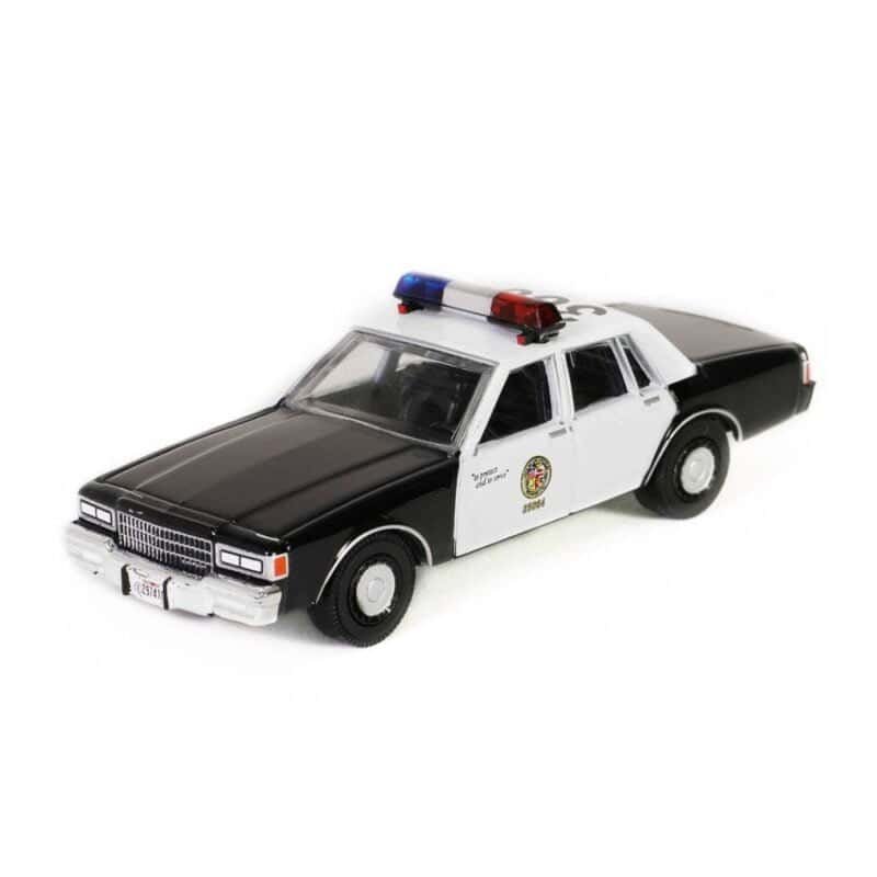 Miniatura coche de policía LAPD Chevrolet Caprice de la película Amor a quemarropa a escala 1/64 Greenlight