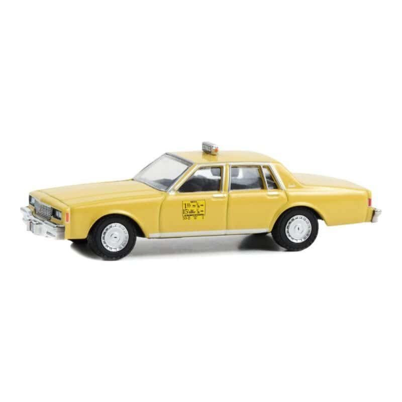 Miniatura coche Chevrolet Impala Taxi amarillo de la película El príncipe de Zamunda a escala 1/64 Greenlight