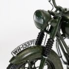 Miniatura moto verde Triumph TR6 Trophy de la película La gran evasión a escala 1/12 Corgi