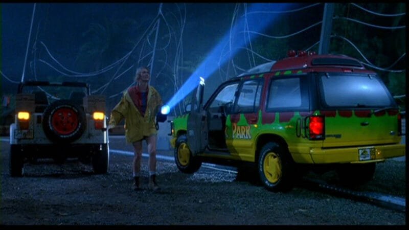 Coche todoterreno rojo, verde y amarillo Ford Explorer de la película Jurassic Park