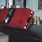 Coche rojo Ford Mustang Mach 1 1969 conducido por James Bond 007 en la película Diamantes para la eternidad