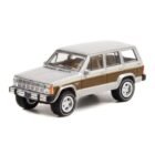 Miniatura coche todoterreno gris y marrón Jeep Cherokee Wagoneer de la serie MacGyver a escala 1/64 Greenlight