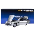 Miniatura coche gris Aston Martin DB5 con todos los gadgets conducido por James Bond 007 en la película Goldfinger a escala 1/18 Autoart