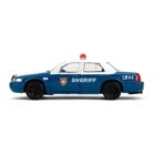 Miniatura coche de policía Ford Crown Victoria de Rick en la serie The Walking Dead a escala 1/32 Jada