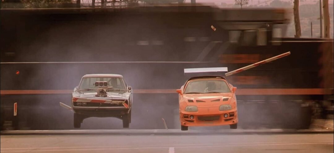 Fast & Furious escena tren con coches