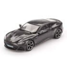 Coche miniatura Aston Martin DBS Sin tiempo para morir conducido por James Bond 007 a escala 1/64 MiniGT