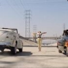 Coche Grease Greased Lightning Ford De Luxe en la carrera del canal