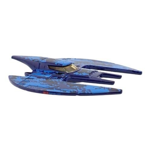 Avión en miniatura Batplane color azul oscuro y negro de la serie Batman La serie animada a escala 1/64 fabricado por Hot Wheels.