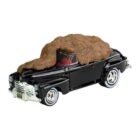Coche en miniatura Ford Super De Luxe 1946 de Biff con estiércol color negro de la película Regreso al Futuro a escala 1/64 fabricado por Hot Wheels.